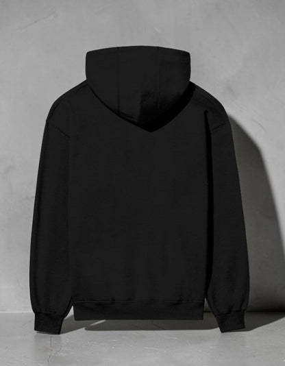 Back view of a Zanthra Store unisex black heavyweight cotton fleece hoodie with a relaxed fit and ribbed cuffs.